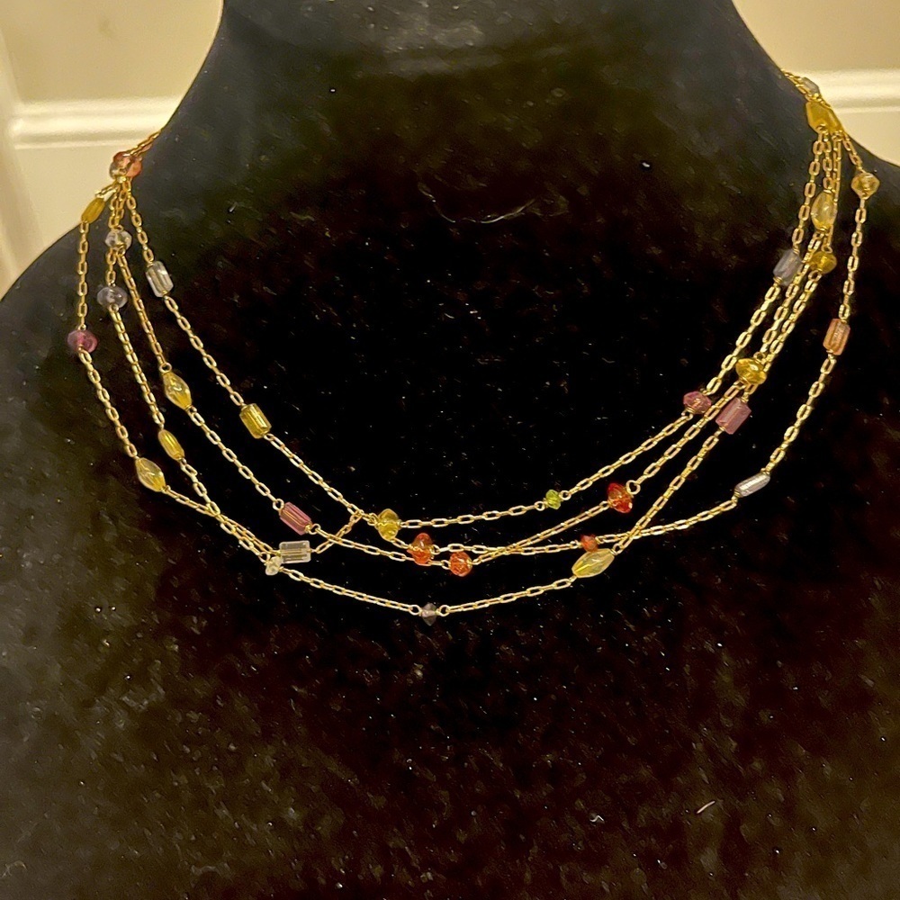 Four chains. One necklace. Pretty dainty small beads necklace